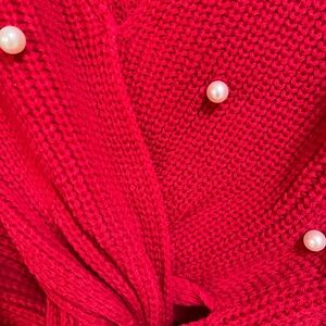 Woman’s Sexy Twist back Sweater Red with Pearls. A must have for Holidays.